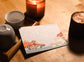  YS Notes multipage card and candles on wooden desk
