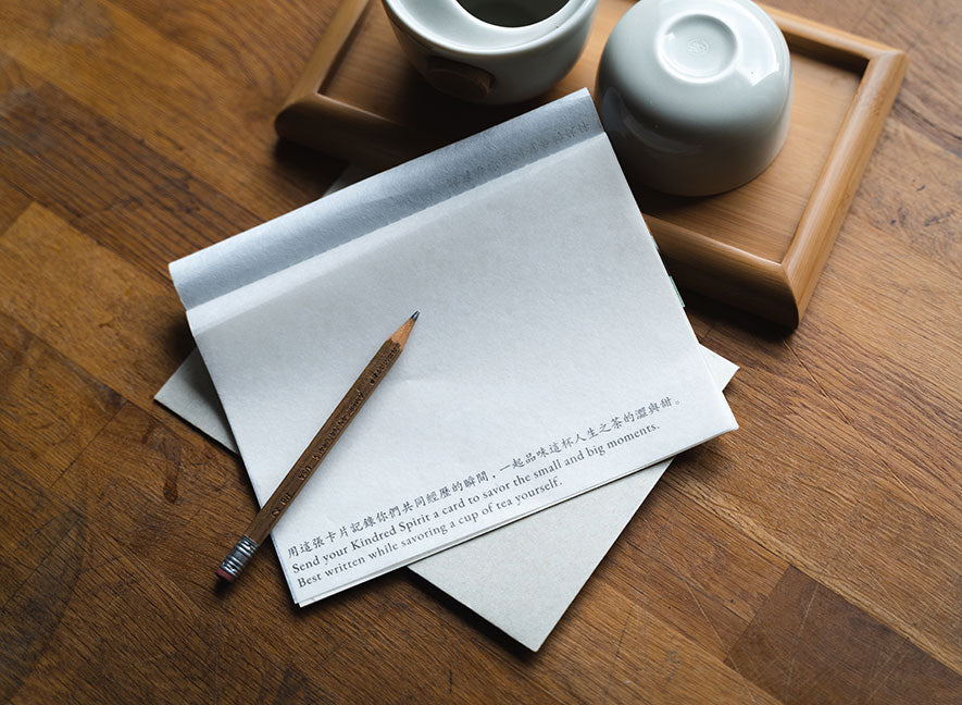  YS Notes multipage card and pencil on wood desk