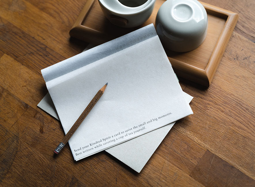  YS Notes multipage card (English-version) and pencil on wood desk